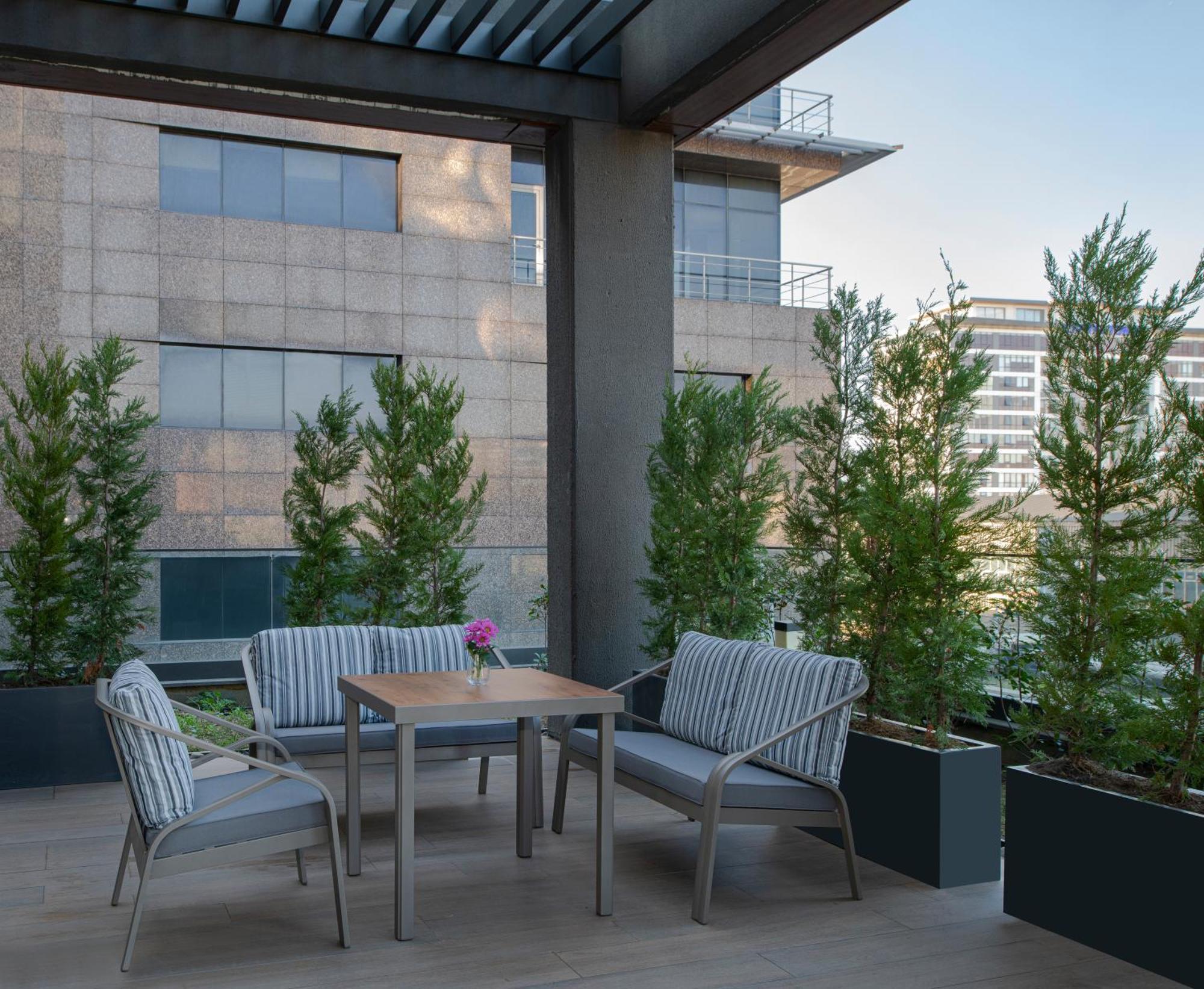 Movenpick Living Istanbul West Hotel Luaran gambar A 3D rendering of a patio